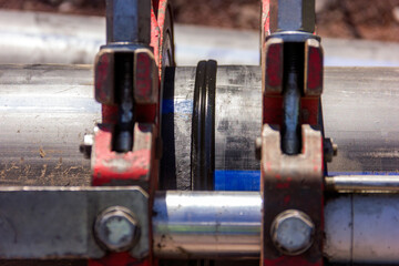 Polyethylene or polythene pipe welding. The strength increase is due primarily to the constraint of...