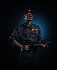 Fototapeta premium black guy in force police. english translation Police, Russia