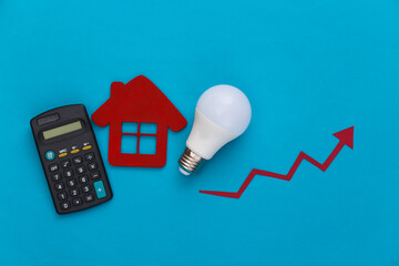 The concept of calculating energy consumption, modernization. Growth arrow tending up with light...