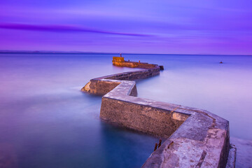 Breakwater zig zag pier at st monans, fife, scotland,UK.