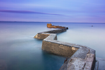 Breakwater zig zag pier at st monans, fife, scotland,UK.