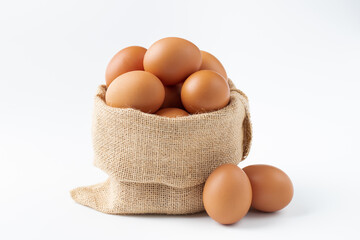 Eggs in sacks isolated on white background