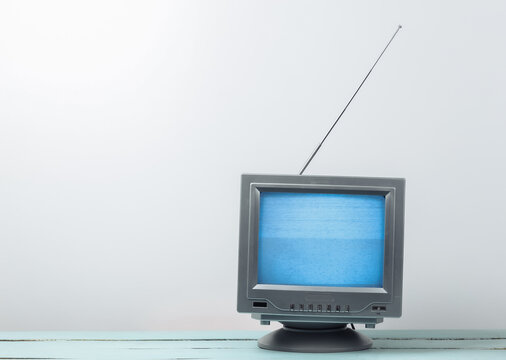 Mini Retro Tv Antenna Receiver On A White Background. Old Fashioned TV Set. Television Noise, No Signal. 80s