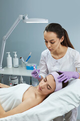beautiful woman getting beauty injections. cosmetology