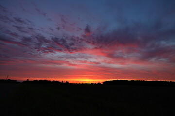 Naklejka na ściany i meble Beautiful sunset over farmland in Polk County Wisconsin 