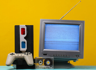 Retro media, entertainment 80s. Antenna old-fashioned retro tv receiver, anaglyph stereo glasses,...