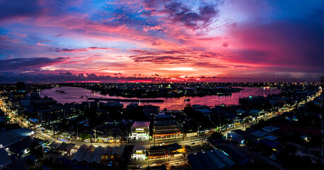 Samutsakorn at thailand, waterfont with boat,twighlight time ,Aerial drone view.