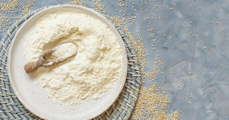 Raw white quinoa floour and seeds top view