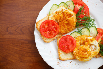 Breakfast on a white plate. Close-up. Top view