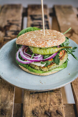 Vegan burger with arugula