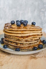 American pancakes with honey and blueberries