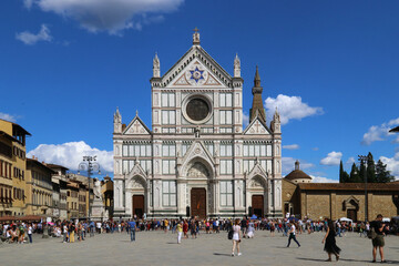 Fototapeta na wymiar Florence, Tuscany, Italy, June 2020, facade and square of Santa Croce (holy Cross) with tourists