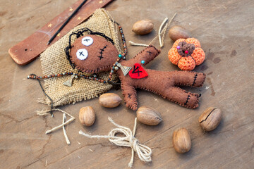Voodoo Doll on a wooden background