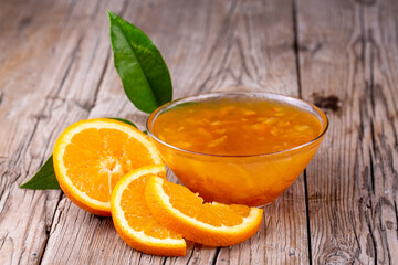 Bowl of orange jam isolated
