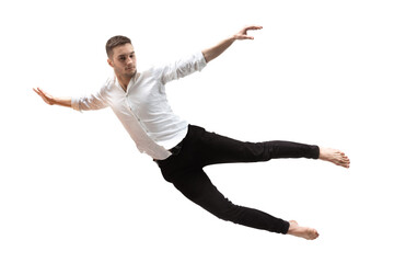 Mid-air beauty cought in moment. Full length shot of young man hovering in air and keeping eyes...