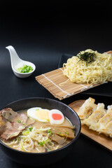 Zaru Ramen ( Japanese cold buckwheat noodles served on bamboo colander) and dipping cold soup, Gyozas, (fried japanese dumplings), tonkotsu ramen (Japanese noodle in pork Bone based soup).