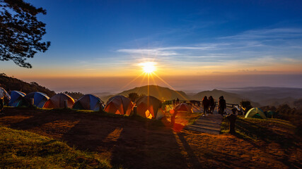 Fototapeta na wymiar View of morning mist and sun rise at Doi Ang Khang mountain Thailand