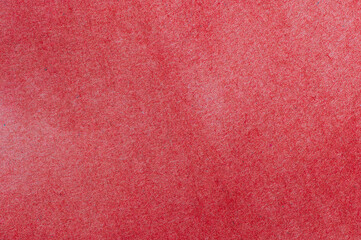 Fototapeta premium Red paper textured background wallpaper. Closeup detail of material