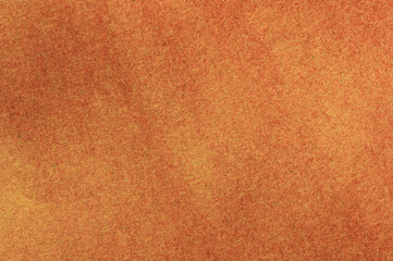 Yellow orange paper textured background wallpaper. Closeup detail of material