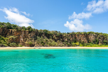 The Beautiful view of Sancho Beach from the sea, with turquoise clear water, at Fernando de Noronha Marine National Park, a Unesco World Heritage site, Pernambuco, Brazil