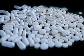 Impressive view of a-lot of pilles, caplets, tablets for medical use 