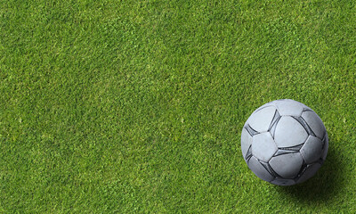Fototapeta na wymiar Soccer ball and equipment on grass background