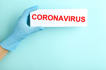 Doctor holding paper with text