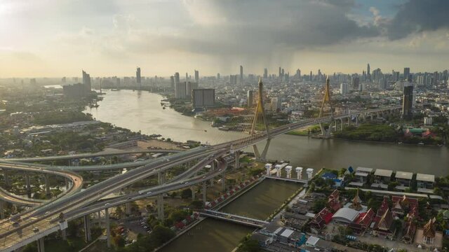 Aerial view of Bhumibol bridge and Chaopraya river with Bangkok city during raining on background, Thailand