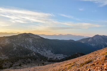 Obraz premium Beautiful landscape in the Taurus mountains from the top of mount Tahtali at sunset. Kemer, Turkey.