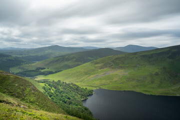 Panoramic view of  The Guinness Lake (Lough Tay) -  a movie and series location, such as Vikings. Close to Dublin City, popular tourist destination.