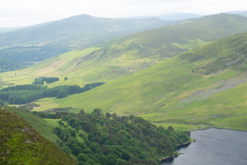 Fototapeta premium Panoramic view of Wicklow Mountains. This place is famous for uncontaminated nature, misty landscapes, and spectral lakes