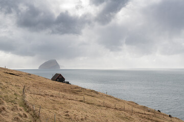 Lonely house on the Atlantic Ocean edge 
