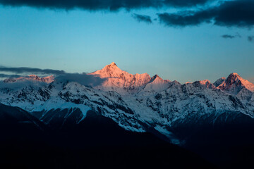 Obraz na płótnie Canvas Sunrise at Snow Mountain Meili, a sacred mountain in Tibet, China.