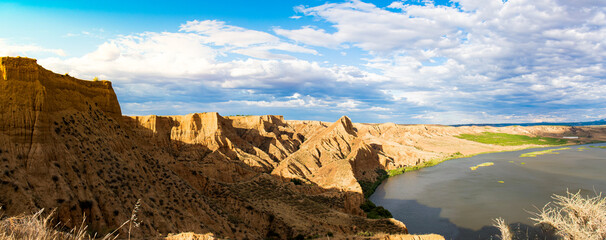 panoramic landscape of cliff with clouds in Toledo to the step of the Tajo river