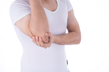 A man feeling exhausted and suffering from arm and elbow pain and injury on isolated white background. Health care and medical concept.