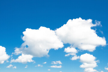 Fototapeta na wymiar Summer blue sky with perfect white clouds. Cloudscape background
