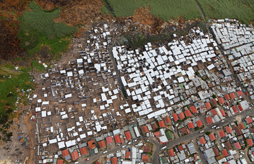Cape Town, Western Cape / South Africa - 12/09/2015: Aerial photo of shacks along a wetland
