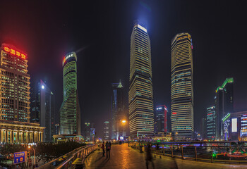 View to the impressive skyscrapers of Shanghai Pudong district at night in summer
