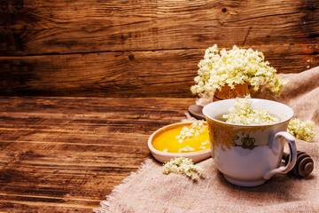 Tea from fresh elder flowers. Hot drink, honey, alternative medicine