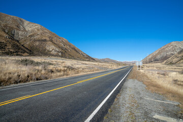 Beautiful highway road with mountain in rural on day time.