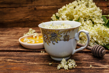 Tea from fresh elder flowers. Hot drink, honey, alternative medicine