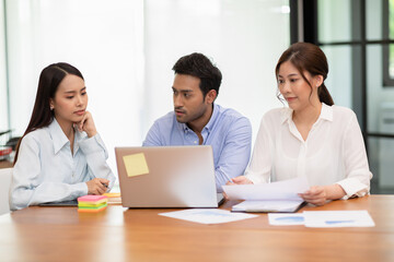 Group of young Startup coworkers working together to get ideas