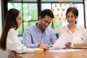 Group of young Startup coworkers working together to get ideas