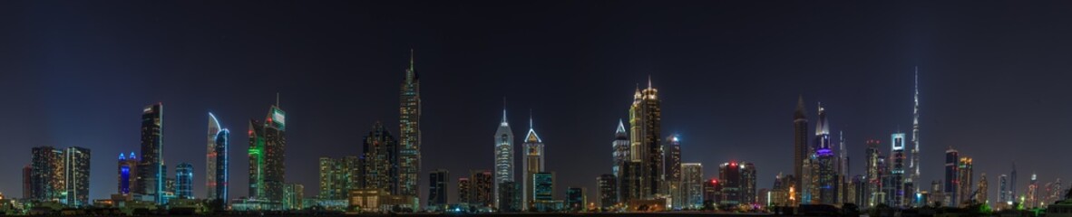 Night panorama picture of Dubai skyline in spring