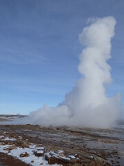 Steam coming from geyser in Iceland