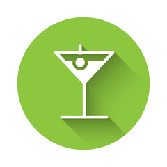White Martini glass icon isolated with long shadow. Cocktail icon. Wine glass icon. Green circle button. Vector Illustration