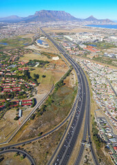 Naklejka premium Cape Town, Western Cape / South Africa - 02/23/2017: Aerial photo of N1 highway and Century City with Table Mountain in the background