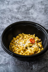 Mac and Cheese, American Style Macaroni Pasta with Cheesy Sauce and Crunchy Breadcrumbs Topping on.