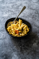 Mac and Cheese, American Style Macaroni Pasta with Cheesy Sauce and Crunchy Breadcrumbs Topping on.