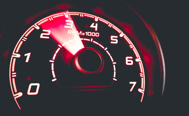 Fototapeta premium Driver's cockpit ; speedometer on dashboard - colorful light in black, copy space for your abstract design 